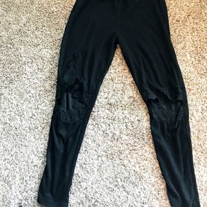 Large stretchy hole in k res with lace around holes